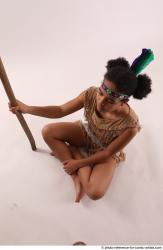 ANISE SITTING POSE WITH SPEAR